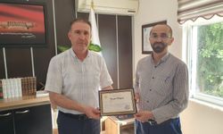 Din görevlisi Fikri Çınar'a DİB tarafından başarı belgesi