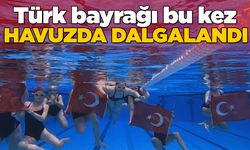Sinop’ta sporcular su altında Türk bayrağı açtı