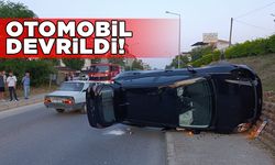 Kaldırıma çarpan otomobil devrildi
