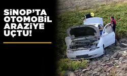 Sinop’ta araç boş araziye savruldu