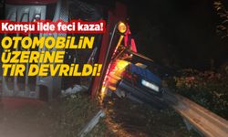 Otomobilin üzerine tır devrildi