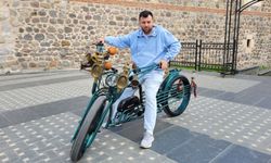 Eski parçaları kullanarak elektrikli bisiklet yaptı