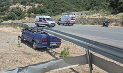 Otomobil çelik bariyerin altına girdi