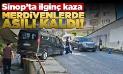 Sinop'ta ilginç kaza: Araç merdivenlerde asılı kaldı