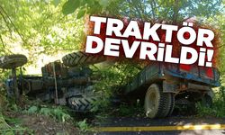 Kontrolden çıkan traktör devrildi