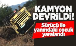 Kamyon devrildi: Sürücü ile yanındaki çocuk yaralandı!