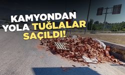 Kamyondan yola saçılan tuğlalar tehlike oluşturdu
