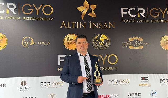 Sinoplu yazar kitabıyla ödül aldı
