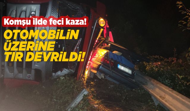 Otomobilin üzerine tır devrildi