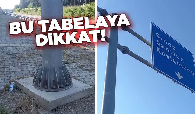 Sinop'ta rüzgârın gevşettiği tabela tehlike oluşturuyor