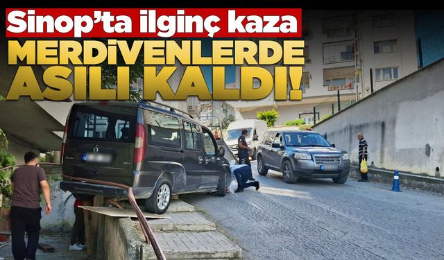 Sinop'ta ilginç kaza: Araç merdivenlerde asılı kaldı