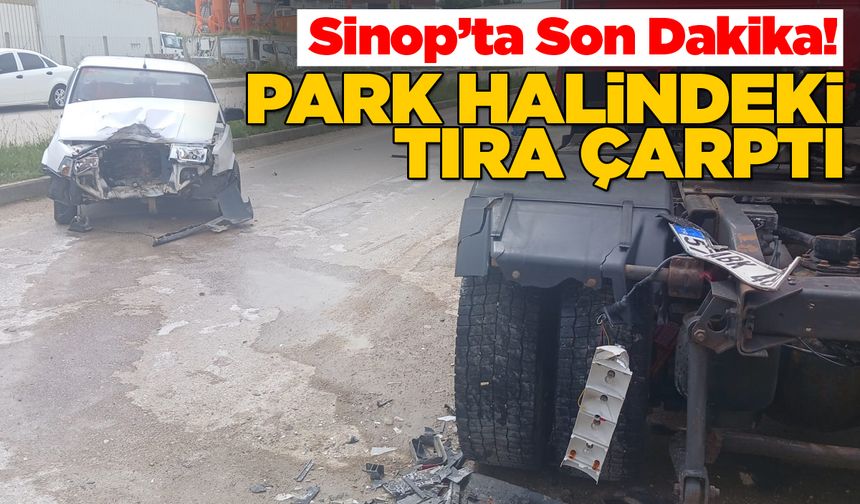 Otomobil park halindeki tıra çarptı