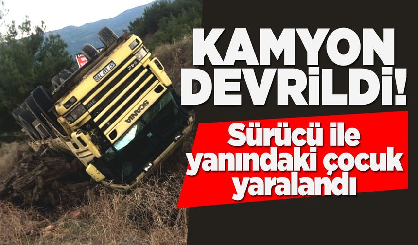 Kamyon devrildi: Sürücü ile yanındaki çocuk yaralandı!